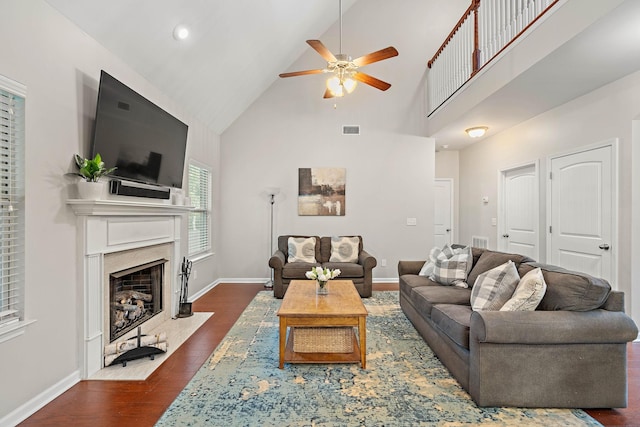 2034 Lincoln Rd, Spring Hill, TN 37174 - living room with a ceiling fan, wood finished floors, high vaulted ceiling, a fireplace, and baseboards