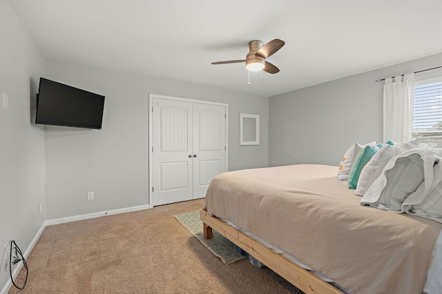 2034 Lincoln Rd, Spring Hill, TN 37174 - bedroom featuring baseboards, light carpet, ceiling fan, and a closet