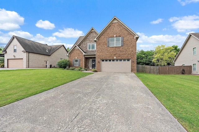 2034 Lincoln Rd, Spring Hill, TN 37174 - view of front facade featuring brick siding, driveway, and a garage