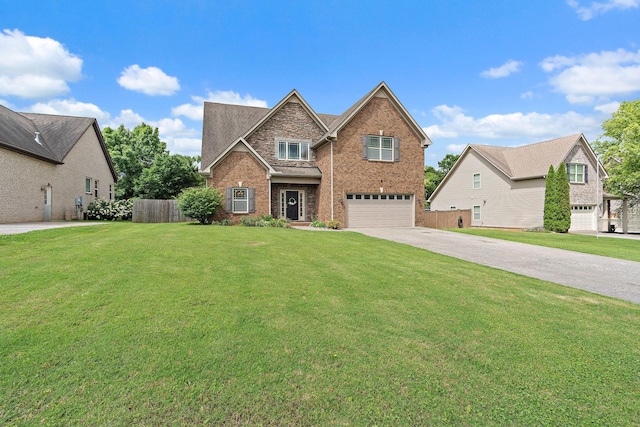 2034 Lincoln Rd, Spring Hill, TN 37174 - view of front of home with an attached garage, concrete driveway, and brick siding