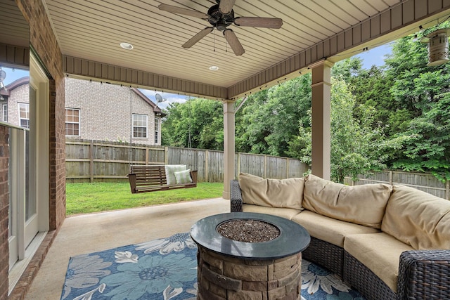 2034 Lincoln Rd, Spring Hill, TN 37174 - fenced backyard featuring an outdoor living space with a fire pit, a patio, and ceiling fan
