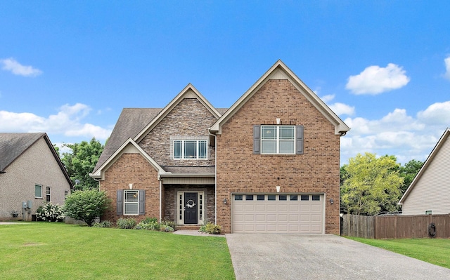 2034 Lincoln Rd, Spring Hill, TN 37174 - view of front facade with a garage, driveway, and brick siding