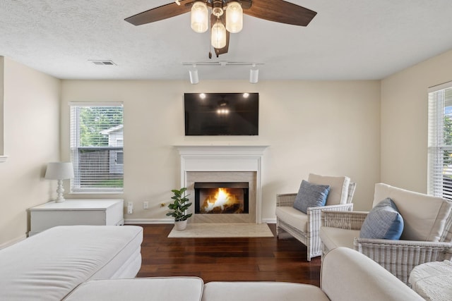 4641 Cather Ct, Nashville, TN 37214 - living area featuring wood finished floors, plenty of natural light, a ceiling fan, and track lighting