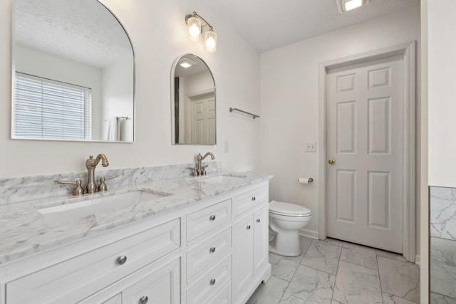 4641 Cather Ct, Nashville, TN 37214 - bathroom featuring marble finish floors, double vanity, and toilet