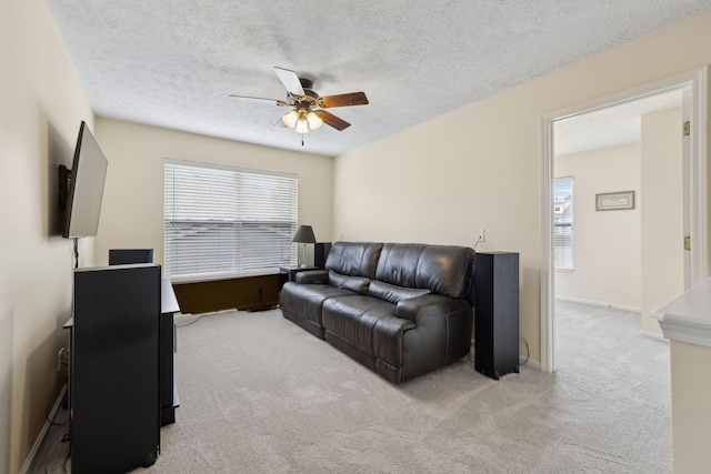 4641 Cather Ct, Nashville, TN 37214 - living area with carpet, a ceiling fan, a textured ceiling, and baseboards