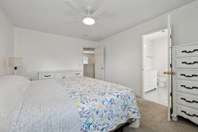 4641 Cather Ct, Nashville, TN 37214 - bedroom with ensuite bath, a ceiling fan, and light carpet