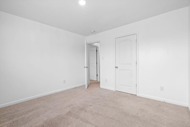 3751 Spahn Ln, Murfreesboro, TN 37128 - unfurnished bedroom with light carpet, baseboards, and recessed lighting