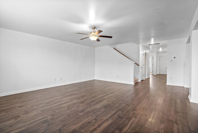 3751 Spahn Ln, Murfreesboro, TN 37128 - unfurnished living room featuring a ceiling fan, dark wood-type flooring, stairway, and baseboards