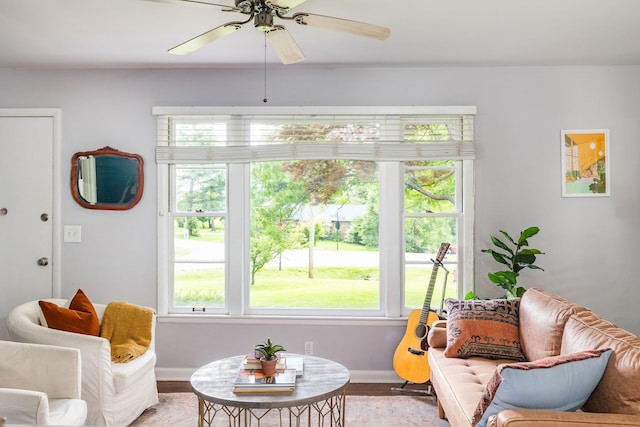 2101 Dearborn Dr, Nashville, TN 37214 - living area with plenty of natural light, wood finished floors, baseboards, and a ceiling fan