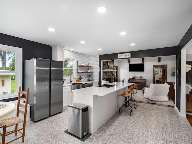2521 Greens Mill Rd, Columbia, TN 38401 - kitchen featuring freestanding refrigerator, plenty of natural light, a sink, white cabinets, and recessed lighting