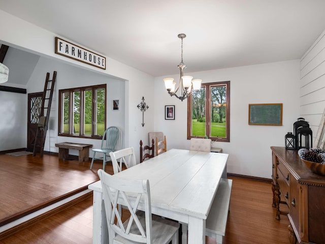 2521 Greens Mill Rd, Columbia, TN 38401 - dining area with a chandelier, wood finished floors, and baseboards