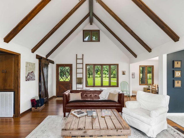 2521 Greens Mill Rd, Columbia, TN 38401 - living area with high vaulted ceiling, wood finished floors, beamed ceiling, and baseboards