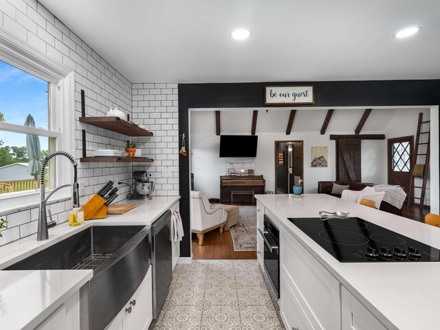 2521 Greens Mill Rd, Columbia, TN 38401 - kitchen with black appliances, a sink, open floor plan, light countertops, and recessed lighting