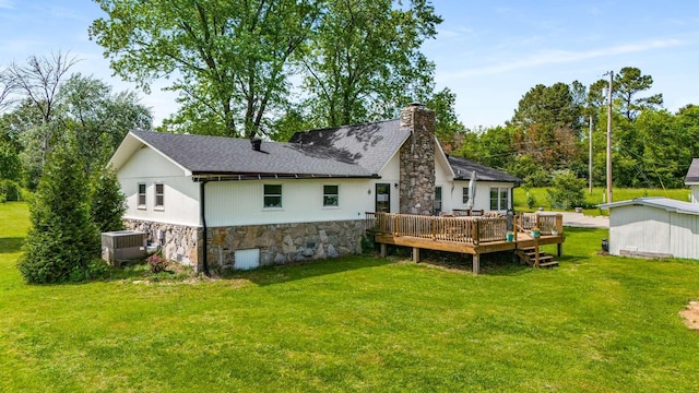2521 Greens Mill Rd, Columbia, TN 38401 - back of property featuring stone siding, central air condition unit, a wooden deck, a yard, and a chimney