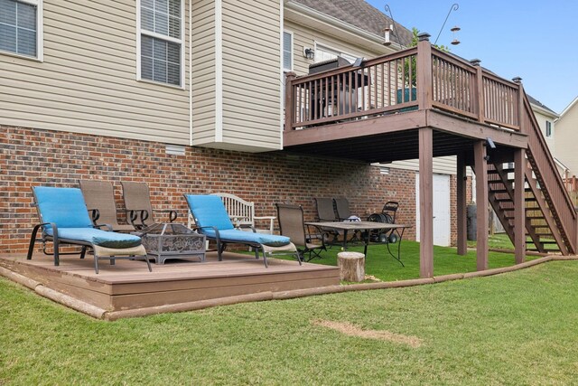 1179 Viewmont Dr, Clarksville, TN 37040 - back of property with a wooden deck, brick siding, and a yard