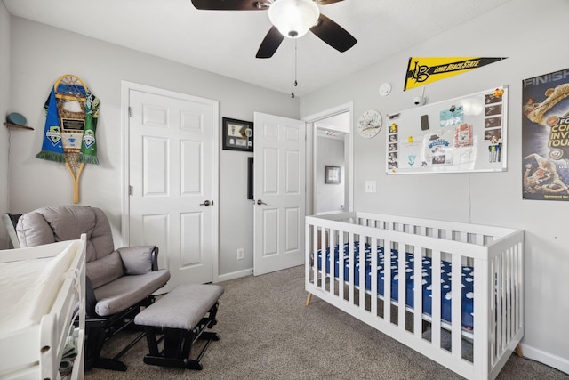 1179 Viewmont Dr, Clarksville, TN 37040 - carpeted bedroom featuring a nursery area, baseboards, and a ceiling fan