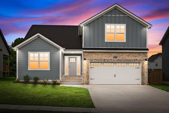 125 Anderson Pl, Clarksville, TN 37042 - view of front of property featuring board and batten siding, concrete driveway, a garage, stone siding, and a shingled roof