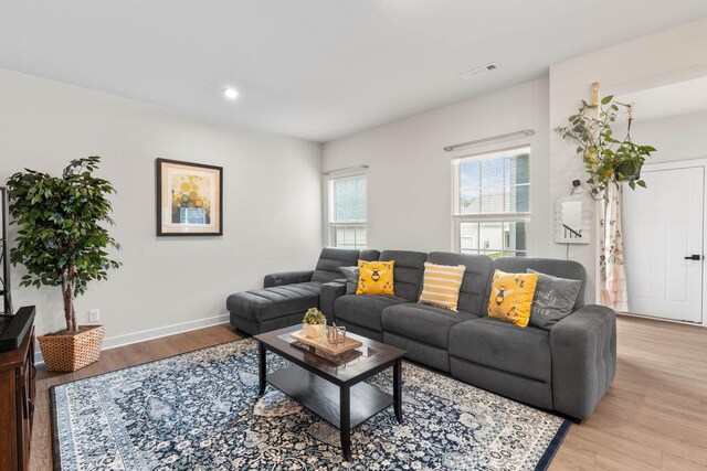 8061 Warbler Way, Brentwood, TN 37027 - living room featuring light wood-style floors, baseboards, and recessed lighting
