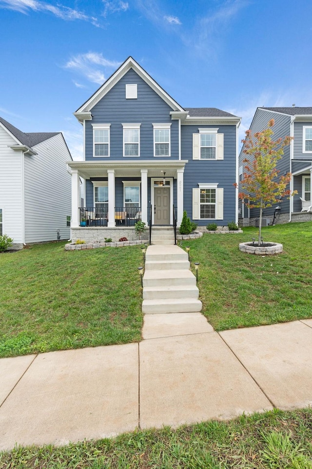 8061 Warbler Way, Brentwood, TN 37027 - view of front of home featuring covered porch and a front lawn