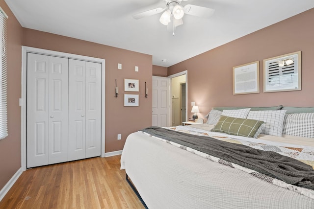 301 Tyler Dr, Hermitage, TN 37076 - bedroom with baseboards, light wood finished floors, a closet, and ceiling fan