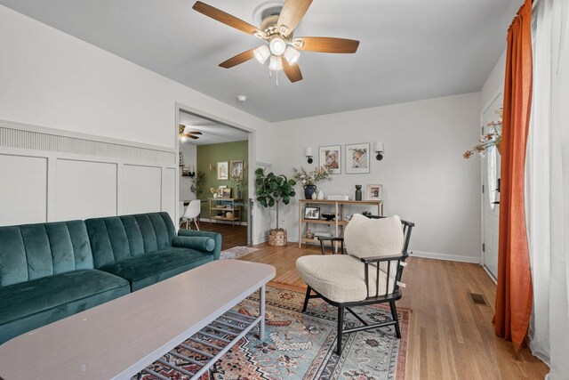 301 Tyler Dr, Hermitage, TN 37076 - living room featuring ceiling fan, light wood-style floors, and baseboards