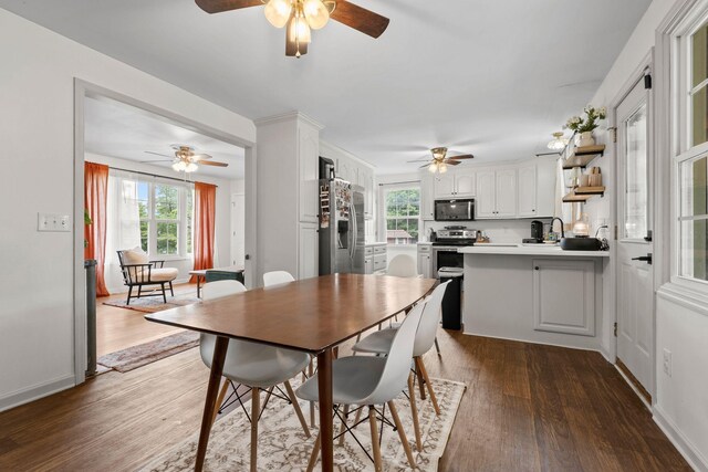 301 Tyler Dr, Hermitage, TN 37076 - dining space with ceiling fan, healthy amount of natural light, wood finished floors, and baseboards