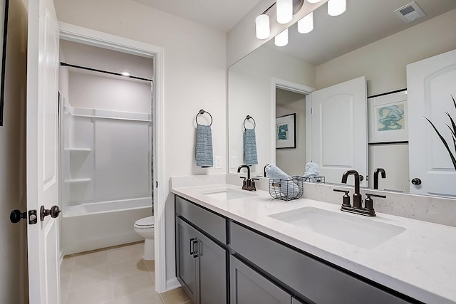 5053 Lawler Ln, Old Hickory, TN 37138 - bathroom with double vanity, toilet, tile patterned flooring, and shower / tub combination
