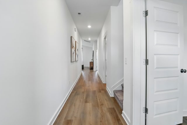 836 Ewell Farm Dr, Spring Hill, TN 37174 - hallway with recessed lighting, wood finished floors, and baseboards