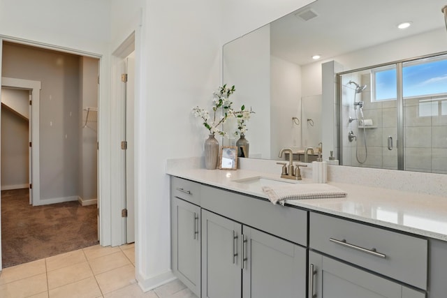 836 Ewell Farm Dr, Spring Hill, TN 37174 - full bath with a shower stall, vanity, baseboards, a walk in closet, and tile patterned floors