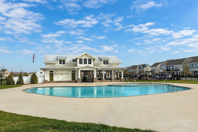836 Ewell Farm Dr, Spring Hill, TN 37174 - community pool featuring a patio area and a residential view