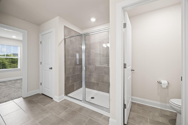 700 Taylor Bend Rd, Columbia, TN 38401 - full bathroom featuring a stall shower, toilet, baseboards, recessed lighting, and tile patterned flooring