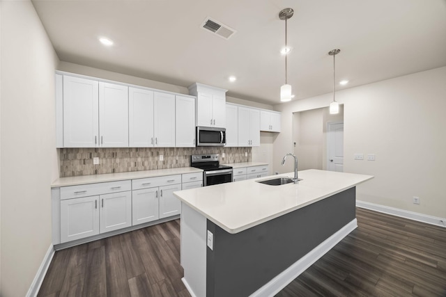 700 Taylor Bend Rd, Columbia, TN 38401 - kitchen with appliances with stainless steel finishes, a sink, dark wood finished floors, baseboards, and recessed lighting