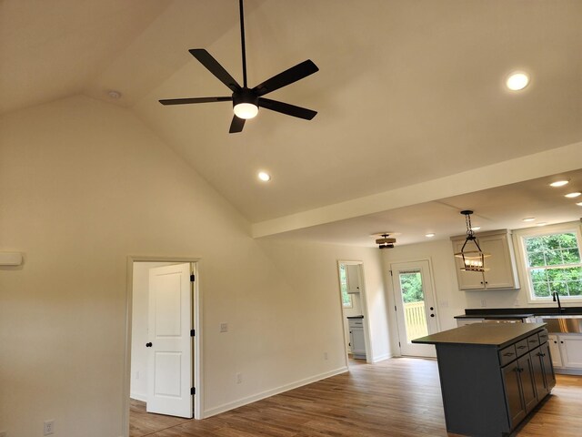 524 Pleasant Hill Rd, Lafayette, TN 37083 - kitchen with dark countertops, a center island, wood finished floors, ceiling fan, and recessed lighting