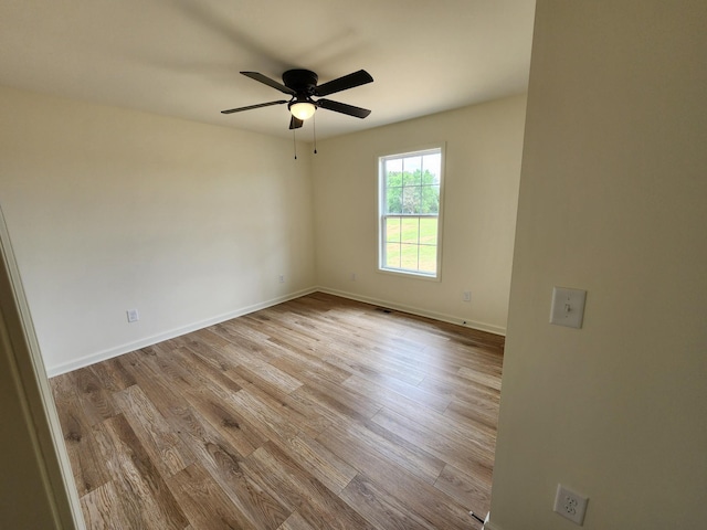 524 Pleasant Hill Rd, Lafayette, TN 37083 - empty room featuring wood finished floors, a ceiling fan, and baseboards