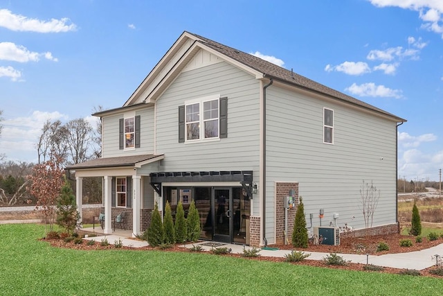 188 Millbrook Dr, Spring Hill, TN 37174 - back of house with brick siding, a yard, and a patio