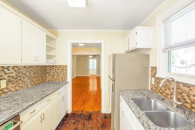 2401 Vaulx Ln, Nashville, TN 37204 - kitchen with a sink, freestanding refrigerator, dark wood finished floors, backsplash, and ornamental molding