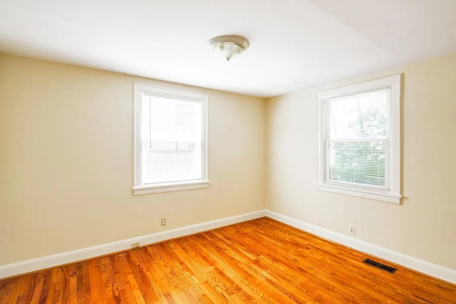 2401 Vaulx Ln, Nashville, TN 37204 - empty room featuring baseboards and light wood-type flooring