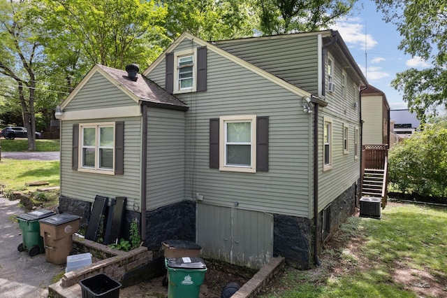 2401 Vaulx Ln, Nashville, TN 37204 - rear view of property featuring central AC