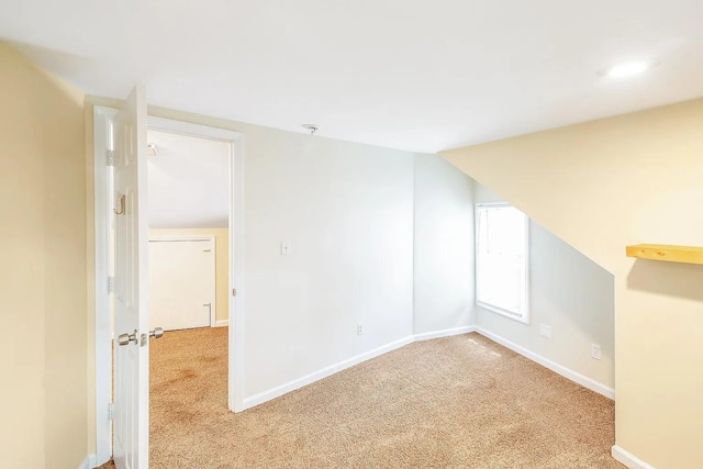 2401 Vaulx Ln, Nashville, TN 37204 - additional living space featuring carpet flooring, baseboards, and lofted ceiling