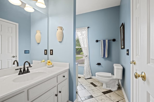 3615 Legacy Dr, Springfield, TN 37172 - full bath with toilet, vanity, baseboards, and marble finish floors