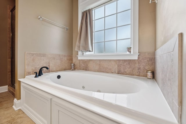 4322 Thoroughbred Ln, Murfreesboro, TN 37127 - full bathroom with a tub with jets, healthy amount of natural light, a shower with shower door, and baseboards