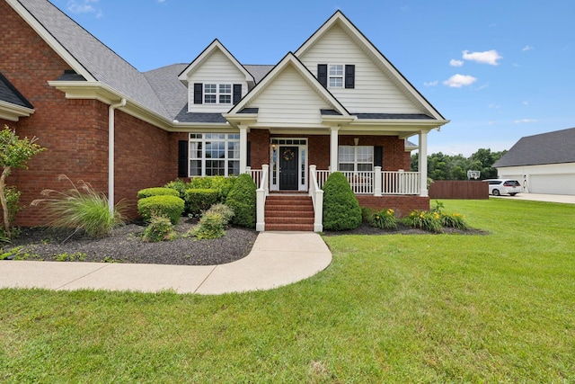 4322 Thoroughbred Ln, Murfreesboro, TN 37127 - view of front of property with brick siding, a front lawn, a porch, and a shingled roof