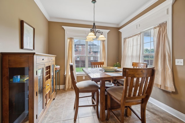 4322 Thoroughbred Ln, Murfreesboro, TN 37127 - dining area with baseboards, crown molding, a chandelier, and light tile patterned floors