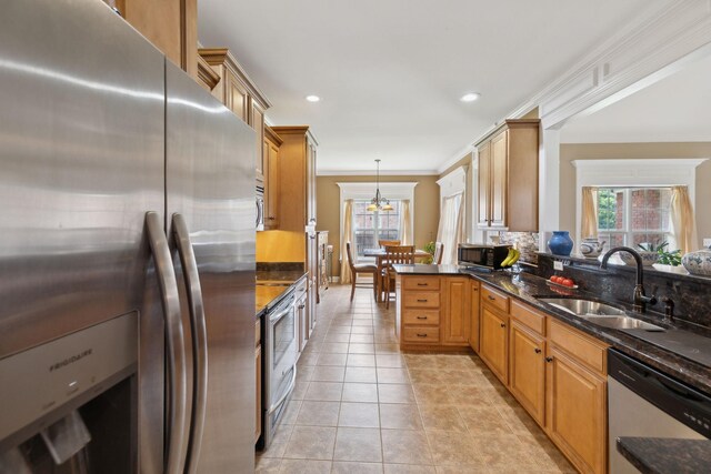 4322 Thoroughbred Ln, Murfreesboro, TN 37127 - kitchen featuring appliances with stainless steel finishes, a sink, decorative backsplash, recessed lighting, and crown molding