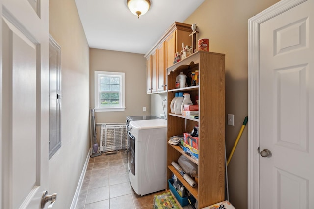 4322 Thoroughbred Ln, Murfreesboro, TN 37127 - laundry area featuring independent washer and dryer, baseboards, cabinet space, and light tile patterned floors