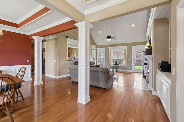 4322 Thoroughbred Ln, Murfreesboro, TN 37127 - living room with decorative columns, ceiling fan, light wood-style flooring, ornamental molding, and a decorative wall