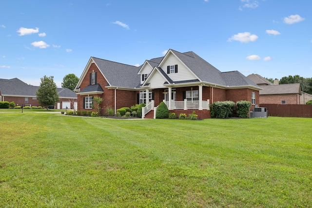 4322 Thoroughbred Ln, Murfreesboro, TN 37127 - traditional home with covered porch, brick siding, cooling unit, and a garage