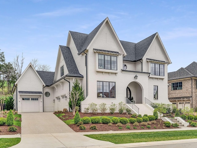 9021 Passiflora Ct, College Grove, TN 37046 - french provincial home with stairway, concrete driveway, and a shingled roof