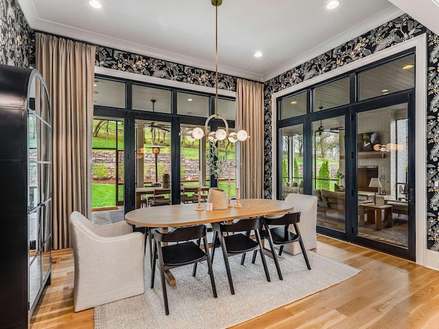 9021 Passiflora Ct, College Grove, TN 37046 - dining room with a ceiling fan, ornamental molding, light wood finished floors, wallpapered walls, and recessed lighting