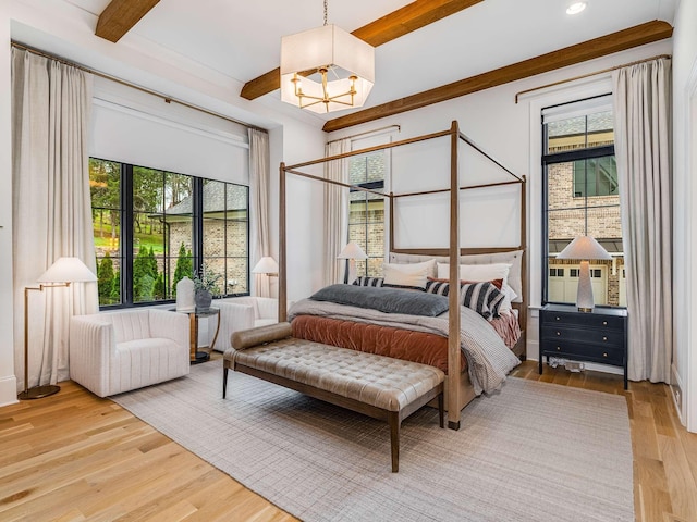 9021 Passiflora Ct, College Grove, TN 37046 - bedroom with a chandelier, beamed ceiling, light wood-style flooring, and recessed lighting